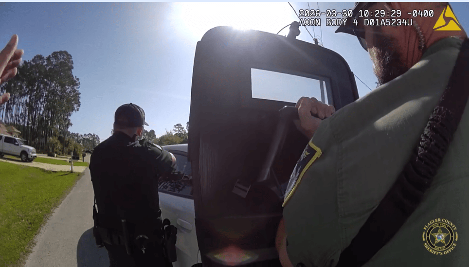 Deputies arresting Lewis during incident