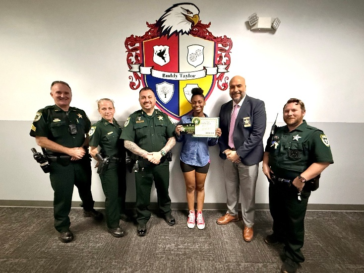 Alina Smalls receiving ‘Great Kid’ award