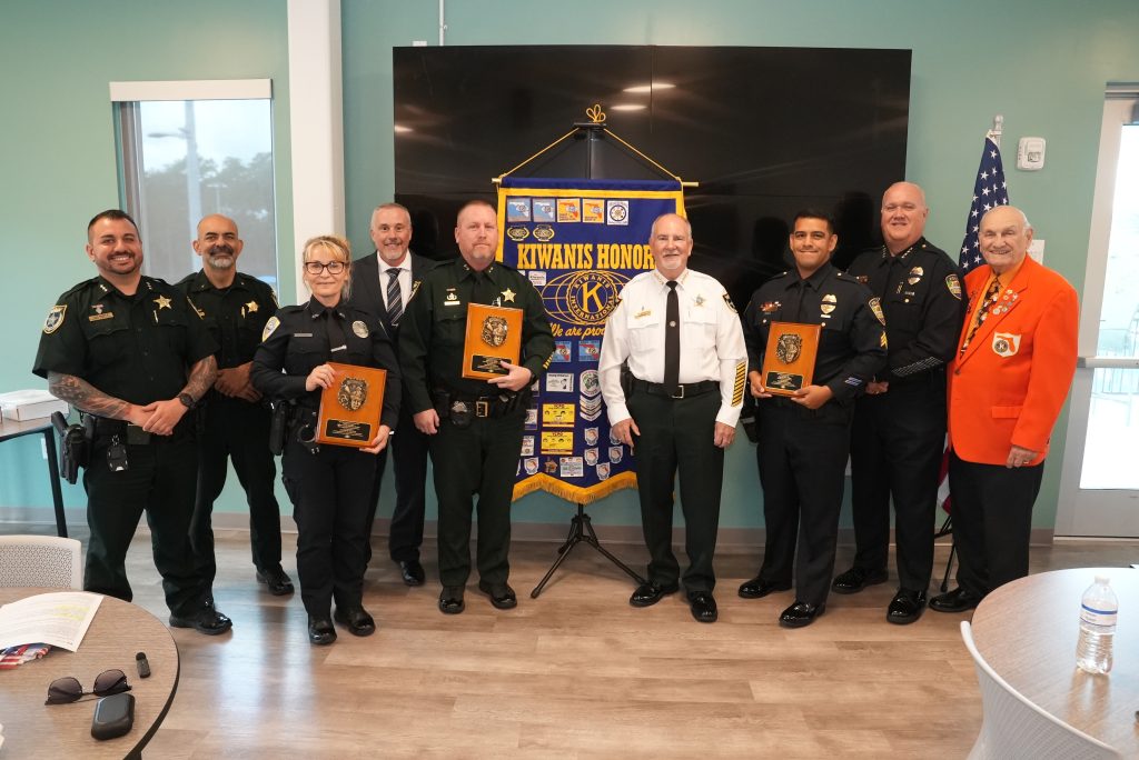 Members of the Kiwanis Club of Flagler Palm Coast recognize the recipients of the Law Enforcement Officers of the Year awards and their respective agency leaders.