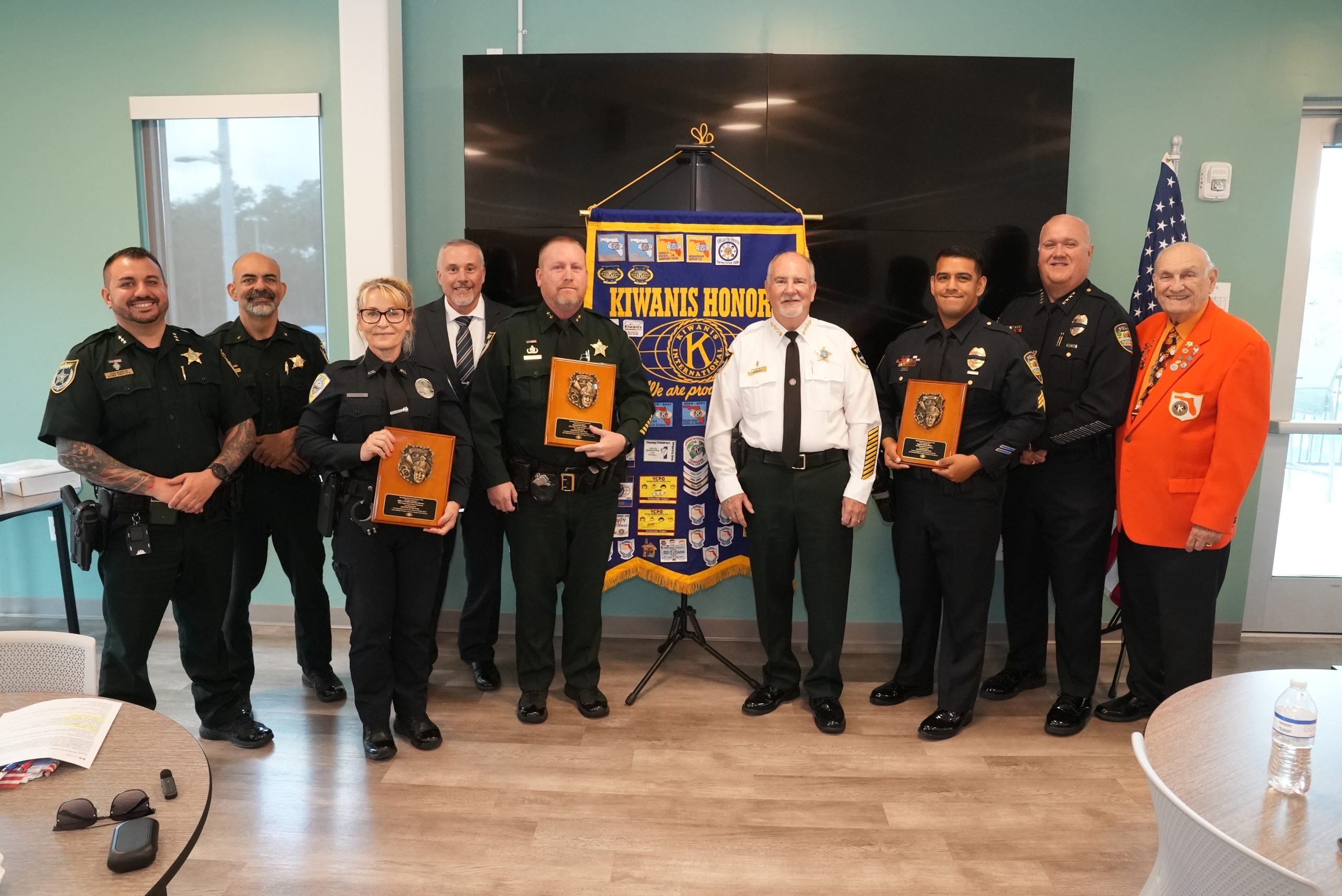 Members of the Kiwanis Club of Flagler Palm Coast recognize the recipients of the Law Enforcement Officers of the Year awards and their respective agency leaders.