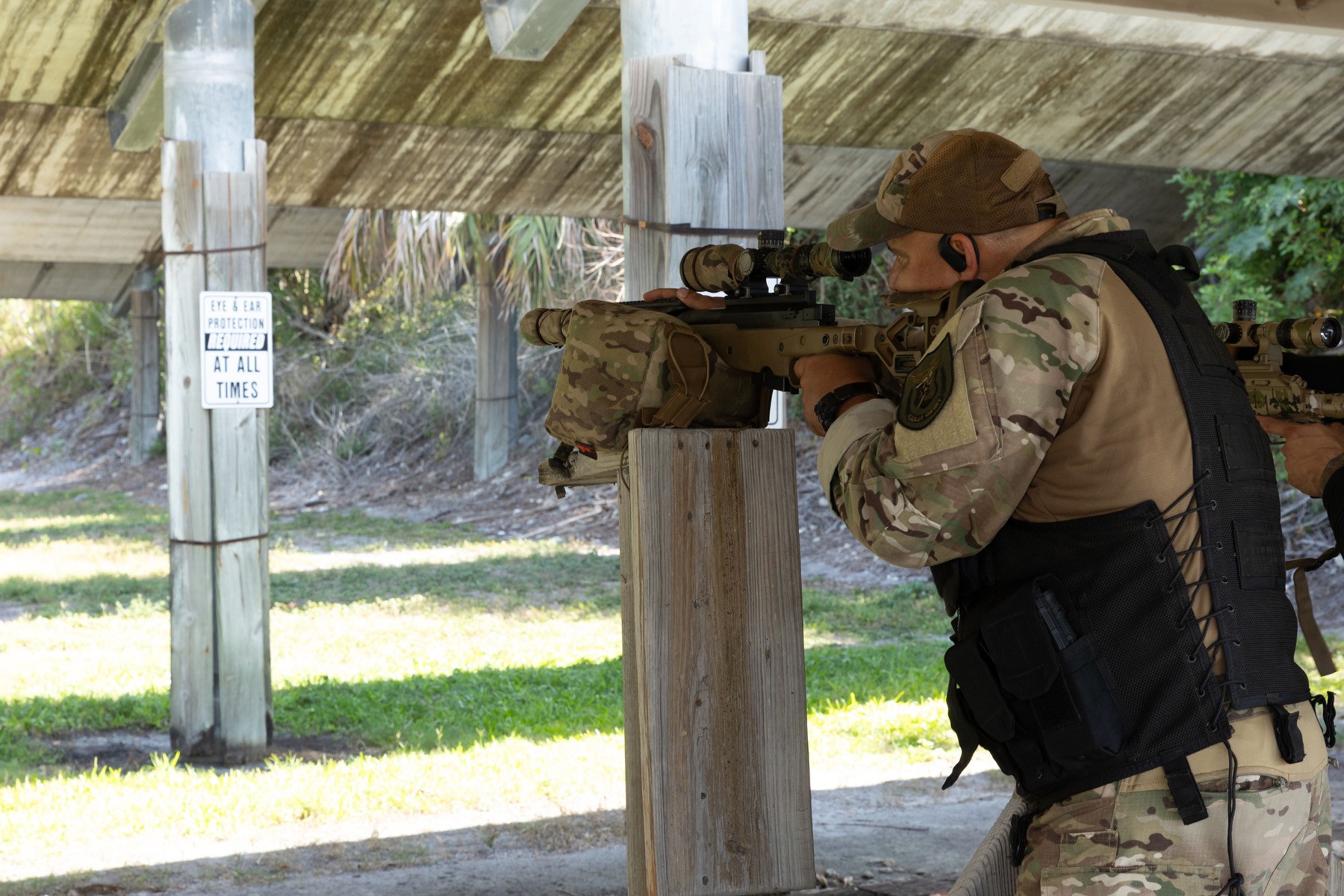 Sergeant Frank Gamarra aims down the sight of a rifle at the Snipercraft Challenge.