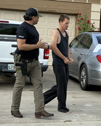 A detective arrests Jayson Jankowski outside his home in Palm Coast, Thursday, June 4, 2026.